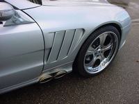 sport_kotfluegel_mercedes-benz_sl_r23042002.jpg